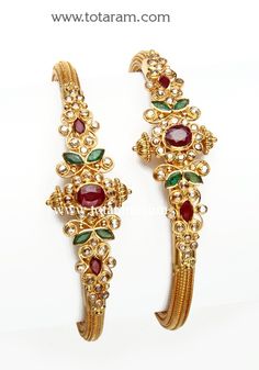 22 Karat Fine Gold Uncut Diamond Kada with Rubies & Emeralds - Set of 2 (1 Pair)
     Width at the Center of the Kada : 19.0 mm
  
  Note: This item comes with a Screw and hinge so that you can open it up for easy wearing.            
  Internal reference code: 2-4 - 235-GK350 - in 38.850 Grams for USD $3499.39. 
Made in India by Totaram Jewelers Online this product is in Gold - 22 Karat BIS Hallmark 916 KDM Gold  & is an excellent gift for Adult - Women. Ships fully insured with secured Uncut Diamond Bangles, Diamond Kada, 22 Karat Gold Jewelry, Indian Gold Jewellery Design, 22k Gold Bangles, Gold Bangles For Women, Beautiful Gold Necklaces, Gold Jewelry Stores, Bangles Making