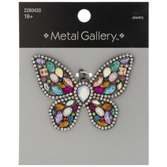 the metal gallery butterfly charm is shown