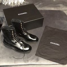 Chanel Black Lace Up Boots Org. Price 1675. Bought In 2023 Brand New Never Wore Unisex Sold As Women Boots In Saks Fifth Avenue Luxury High-top Formal Boots, Luxury High-top Boots For Formal Occasions, Designer Workwear Boots With Lug Sole, Luxury Black Formal Boots, Designer Patent Leather Business Boots, Luxury Lace-up Patent Leather Boots, Designer Formal Boots With Lug Sole, Designer Flat Heel Boots For Work, Luxury Black Patent Leather Boots