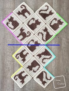 crocheted squares with letters and numbers on them