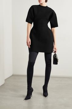 Balenciaga's mini dress is designed in a curvaceous 'Hourglass' shape. Cut from smooth black stretch-ponte, it has a thick handle and dropped shoulder seams. Style yours with matching tights and over-the-knee boots. Balenciaga Tights, Balenciaga Dress, Dresses And Tights, Tight Black Dress, Balenciaga Clothing, Black Balenciaga, Balenciaga Women, Balenciaga Black, Viscose Dress