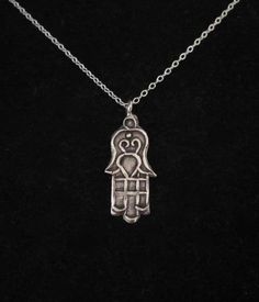 Oxidized 97% sterling silver etched FATIMA/HAMSA HAND pendant and 925 sterling silver necklace chain. Protection and Good Luck symbolPlease choose the length of the chain from the menu.Hilltribe 97% solid sterling silver hand-crafted pendant - 27mm x 11mm (1.06" x 0.43")(including the top ring)The necklace comes bubble wrapped and gift wrapped in a complementary organza bag. Bohemian Sterling Silver Pendant Charm Necklaces, Silver Etched Sterling Silver Necklace, Etched Sterling Silver Necklaces, Bohemian Sterling Silver Charm Necklace Nickel Free, Bohemian Sterling Silver Charm Necklaces In Silver, Spiritual Silver Charm Necklace As Gift, Antique Silver Etched Sterling Silver Necklace, Spiritual Engraved Charm Necklace For Good Luck, Spiritual Good Luck Engraved Charm Necklace