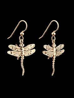 "This pair of detailed Dragon Fly earrings hover gracefully beneath your ears! They are cast in solid 14K gold and have a 1\" wing span. Sturdy 14K gold French Hook Ear Wires are included in the price. This item usually ships the same or next business day. All Marty Magic Jewelry is packaged in a beautiful box, embossed with the gold foil Marty Magic dragon logo. Perfect for any occasion! Designed in Santa Cruz California by Marty Magic. Made in the U.S.A." Elegant Dragonfly Earrings With Ear Wire, Elegant Sterling Silver Dragonfly Earrings, Nickel-free Gold Dragonfly Jewelry, Elegant Dragonfly Jewelry With Ear Wire, Elegant Hypoallergenic Dragonfly Earrings, Elegant Gold Dragonfly Jewelry, Nickel-free Gold Dragonfly Earrings, Gold Dragonfly Earrings For Gift, Gold Nickel-free Dragonfly Earrings