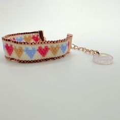 a bracelet that has hearts on it