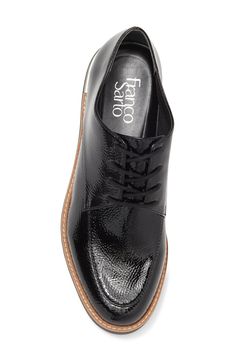 With modern materials, this lightweight lug sole derby is an easy way to polish up any casual fit. 1 1/2" heel, 1/2" platform Round apron toe Lace-up closure Synthetic upper, lining and sole Imported Black Oxfords With Contrast Sole For Work, Casual Patent Leather Platform Oxfords, Low-top Platform Oxfords For Workwear, Trendy Oxfords With Lug Sole For Formal Wear, Trendy Formal Oxfords With Lug Sole, Patent Leather Oxfords With Contrast Sole For Work, Black Oxfords With Lug Sole For Work, Classic Platform Lace-up Shoes For Work, Plain Toe Platform Lace-up Shoes For Work