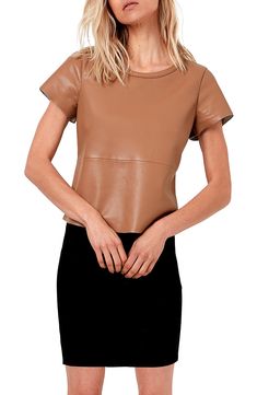 Made from a blend of recycled leather, this T-shirt is a base layer that is far from basic with a very comfortable all-cotton lining. Crewneck Short sleeves Cotton lined 55% recycled leather, 25% polyurethane, 20% polyester Professional leather clean Imported Women's Clothing Leather T Shirt, Layered T Shirt, Recycled Leather, Basic Outfits, Base Layer, Toffee, Comfortable Fashion, V Neck Tops, Sleeve Cotton