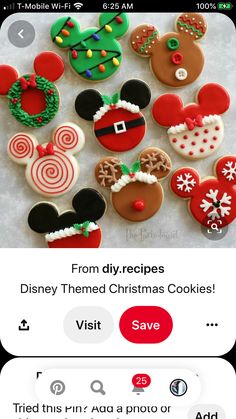 some cookies that are in the shape of mickey mouses and christmas wreaths on top of each other