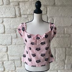 Collectif Sasha Cat Mainline Tee Shirt Size: 2xl / Uk18 Length: 15” Width: 19” ( Measurements Taken Flat From Pit To Pit) Condition: New W/ Tags Trendy Cat Print Summer Tops, Trendy Cat Print Tops For Summer, Trendy Summer Tops With Cat Print, Trendy Pink Blouse With Graphic Print, Pink Short Sleeve Top With Hello Kitty Print, Trendy Pink Top With Cat Print, Trendy Pink Tops With Cat Print, Casual Cotton Tops With Cat Print, Casual Cotton Top With Cat Print