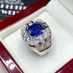 BRAND-NEW!! ONE OF A KIND, HANDCRAFTED RING. EXQUISITE AND FINE CRAFTSMANSHIP! HANDMADE TO LAST FOR AN ETERNITY!! HEIRLOOM PIECE!! PRECIOUS JEWELRY TO BE PASSED ON! PERFECT DRESS RING FOR A GENTLEMAN! 4.63 total carat weight, Certified, Natural blue sapphire ring. This ring offers an important statement of who you are with a 3.21 carats, VIVID BLUE, transparent, CEYLON BLUE SAPPHIRE. Accentuating the BLUE SAPPHIRE are the 46 F/VS, sparkling natural diamonds SUGGESTED RETAIL VALUE: $10,500   BLUE Luxury Sapphire-colored Diamond Ring, Luxury Sapphire-colored Diamond Ring With Diamond Cut, Luxury Sapphire Diamond Ring With Diamond Cut, Luxury Sapphire Birthstone Ring, Luxury Sapphire Cluster Ring, Luxury Sapphire Diamond Ring With Vvs Clarity, Formal Sapphire Diamond Cut Ring, Formal Sapphire-colored Diamond Ring, Luxury Sapphire Birthstone Ring For Formal Occasions