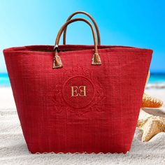 This elegant beach bag is made by Le Comptoir De LA Plage -  Franch well known company since 1999 - entirely made by hand in Madagascar, from Raffia, with leather handles. You can choose 1 of 4 frames (see picture 2). Dual carrying handles 19"W x 12.5"H x 6"D Flat base Accent stitching on bottom Entirely hand made from natural fibers 100%  Authentic  Personalized by request with Monogram or Name Colors available: - natural with green border -natural with red border - pink - red - yellow - turquo Blue Summer Bags For The Pool, Blue Summer Pool Bags, Red Double Handle Straw Bag For Travel, Red Straw Bag With Double Handle For Daily Use, Eco-friendly Red Tote Beach Bag, Summer Tote Bag For Pool, Red Double Handle Shoulder Bag For Beach, Eco-friendly Red Tote Bag, Summer Pool Tote Bag