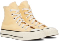 High-top canvas sneakers in yellow. Faux-leather logo patch at inner side. · Round rubber cap toe · Lace-up closure · Eyelets at inner side · Canvas lining · Padded OrthoLite® footbed · Textured rubber midsole · Treaded rubber outsole · Contrast stitching in white Supplier color: Sunny oasis/Egret/Black Spring High-top Sneakers With Rubber Toe Cap, Yellow Casual Sneakers With Rubber Toe Cap, Casual Yellow Sneakers With Rubber Toe Cap, Sporty Yellow Sneakers, Yellow High-top Sneakers With Rubber Toe Cap, Yellow Low-top Sneakers With Rubber Toe Cap, Yellow Converse High-top Sneakers With Rubber Sole, Yellow Converse Canvas Sneakers, Yellow Canvas High-top Sneakers With Vulcanized Sole