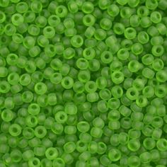 green plastic beads with holes in the middle