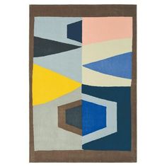 an abstract rug with different colors and shapes