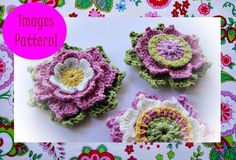 four crocheted flowers are shown on a white surface