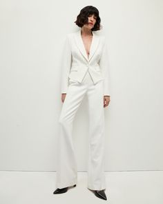 Our best-selling Tonelli pant, reimagined. We updated the wide-leg pant with chic tuxedo stripes on the side. Everything else you love about the style remains the same—the precision tailoring, relaxed fit and clean, flat-front silhouette. Dress it down with a simple tee or sweater or go for a power suit with a black jacket and printed blouse.63% Polyester, 27% Viscose, 7% Cotton, 3% ElastaneLining: 100% PolyesterMade in USADry clean onlyStyle #2410SU0026291