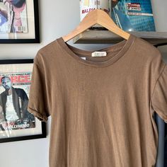 VINTAGE 90s ' Blank Brown T-Shirt sz M Adult CONDITION : Wear and fading from age. No stains or holes. Overall good condition! *This shirt has been washed - Please review pictures* TAGGED SIZE : ** Adult Mens M** ( Fits : Mens M ) MEASUREMENTS : *Please see photos above for measurements. *Disclaimer: All measurements are in inches and are taken laying flat on the ground* *Please review pictures, condition and refer to measurements before purchasing for a more accurate fit: SHIPPING -All orders i Acid Wash Short Sleeve T-shirt For Everyday, Brown Grunge Crew Neck T-shirt, Summer Soft-washed Brown Tops, Vintage Style Relaxed Fit Faded Tops, Vintage Soft-washed Short Sleeve T-shirt, Basic Soft-washed Faded Top, Vintage Distressed Short Sleeve T-shirt, Vintage Relaxed Fit Faded Top, Faded Vintage Tops With Relaxed Fit