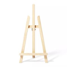 a wooden easel on a white background