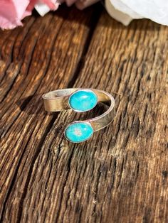 Turquoise band ring.  Can be adjusted for size. Adjustable Turquoise Toe Ring, Adjustable Turquoise Opal Open Ring, Adjustable Turquoise Oval Rings, Adjustable Turquoise Opal Ring, Adjustable Blue Turquoise Toe Ring, Adjustable Turquoise Round Ring, Adjustable Open Turquoise Ring As Gift, Adjustable Open Turquoise Ring For Gift, Adjustable Turquoise Open Ring