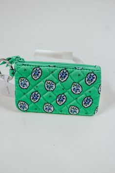 Stay organized and stylish with the Vera Bradley Zip Wallet! Available in two fun colors, this wallet features a convenient ZIP ID CASE to keep all your essentials in one place. Say goodbye to fumbling for your cards and ID - this wallet has got you covered! Green Wallet With Interior Key Chain Holder For Travel, Casual Green Coin Purse For Daily Use, Green Rectangular Wallet With Zipper Pouch, Green Trendy Wallet With Cell Phone Pocket, Trendy Green Wallets With Cell Phone Pocket, Green Rfid Blocking Coin Purse For Travel, Compact Green Wallet For Travel, Casual Green Wallet With Zipper Closure, Compact Green Travel Wallet