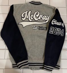 Hi LaborOfLoveCraftHouse Family 💗 PLEASE READ ENTIRE DESCRIPTION BEFORE PURCHASING‼️  Customized Varsity Senior Jacket that can be converted into "Shirt/ Pants Set. Design is Customized at the preference of the customer. If this theme is not what you desire, please add the theme of your choice in the description box.  80% cotton 20% polyester Similar material / thickness to a sweatshirt! NOT A HEAVY JACKET No leather sleeves. Everything is customized with vinyl - no embroidery! Color options please leave in the notes ‼️ If you don't see what you are looking for, please contact me.... All inspired items are made to order.  Please be sure to fill out the personalized section of your order.  THIS IS VERY IMPORTANT ‼️  If you forget you have 12 hours to contact me with the updated information Winter Varsity Jacket With Long Sleeves And School Spirit, Long Sleeve Varsity Jacket With Letter Print For Campus, Letter Print Long Sleeve Varsity Jacket For Campus, School Spirit Outerwear With Letter Print For Winter, School Spirit Letter Print Winter Outerwear, Winter School Spirit Outerwear With Letter Print, School Spirit Cotton Outerwear, Gray Fall Varsity Jacket For College, Cotton Varsity Jacket With School Spirit Style