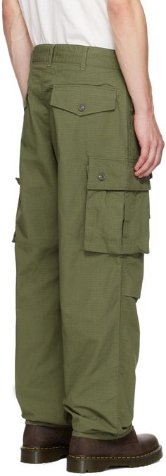 Cotton ripstop cargo pants. · Belt loops · Concealed drawstring at waistband and cuffs · Four-pocket styling · Zip-fly · Flap pockets at front · Tucks at knees Available exclusively at SSENSE. Supplier color: Olive Utility Parachute Pants With Flap Pockets For Outdoor, Outdoor Utility Parachute Pants With Flap Pockets, Front Tuck, Engineered Garments, Flap Pocket, Cargo Pants, Pants, Green, Color