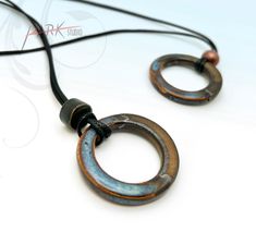 two necklaces that have been made to look like rings