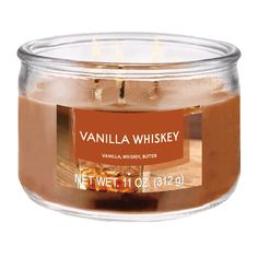 a glass jar filled with vanilla whiskey