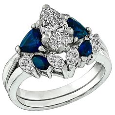 a diamond and blue sapphire engagement ring set