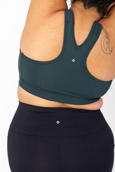 The perfect combo: Support + Comfort. Featuring our top rated SuperHold™ compression fabric, tricot knit liner, and the best plus size fit on the planet. Unlike other bras that you can't wait to take off at the end of the day, our plus size racerback sports bra provides the support you need for medium/high impact activities and is comfy enough to wear all day. As soon as you put one on you'll know it was designed for YOUR body. *SELF Magazine Activewear Awards - Best Sports Bra 2023 Best Compression Sports Bras, Green Compressive Activewear With Medium Bust Support, Green Activewear With Medium Bust Support And Stretch, Green Sports Bra With Medium Bust Support, Green Functional Sports Bra With Medium Bust Support, Supportive Functional Tops With Built-in Padding, Green Sporty Activewear With Medium Bust Support, Compressive Green Activewear With Built-in Bra, Green Compressive Bra-friendly Top