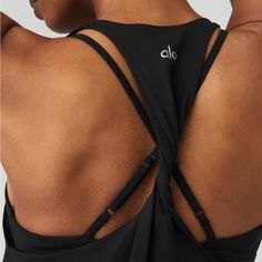 Lightweight, Flowy Tank Twisted, Racerback Detail Designed & Uniquely Fit To Flatter Every Size Wear-Tested By Our In-House Team For The Perfect Fit Alo Yoga Black Activewear With Built-in Bra, Black Top With Built-in Bra And Strappy Back, Black Tops With Built-in Bra And Strappy Back, Alo Yoga Athleisure Tank Top For Gym, Alo Yoga Sporty Tank Top For Sports, Alo Yoga Sporty Tank Top For Gym, Sporty Alo Yoga Tank Top For Sports, Functional Black Top With Built-in Bra, Alo Yoga Sleeveless Stretch Top