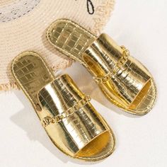 Brand New Casual Gold Flip Flops With Flat Heel, Casual Gold Flat Heel Flip Flops, Trendy Gold Flip Flops For Summer, Casual Gold Flip Flops For Spring, Casual Closed Toe Gold Flip Flops, Casual Gold Closed Toe Flip Flops, Gold Flat Heel Sandals For Spring, Gold Flat Casual Flip Flops, Chic Gold Slides For Vacation