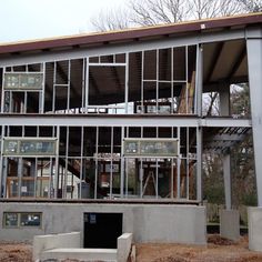 a large building with lots of windows on top of it