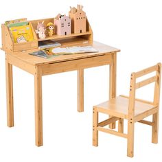 a wooden desk and chair with books on it