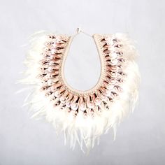 Papua Tribal shells and feathers Necklace, white feathers, home decor necklace Bohemian White Necklaces For Festival, Bohemian White Necklace For Festival, Unique Handmade White Shell Necklace, White Bohemian Shell Necklace For Festival, Bohemian White Shell Necklace For Festival, White Bohemian Shell Beaded Necklaces, White Bohemian Decorative Jewelry, Bohemian Cream Necklace For Festivals, White Shell Necklaces For Festivals