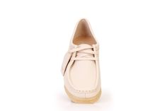 Clarks Originals women's Wallabee shoes features premium premium beige leather uppers and natural rubber pebble crepe soles. Classic Wallabee. Imported. Style number: 26175773