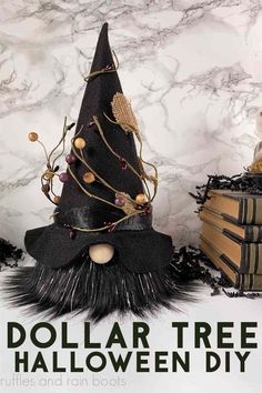 a black witch hat sitting on top of a pile of books with the words dollar tree halloween diy written below it