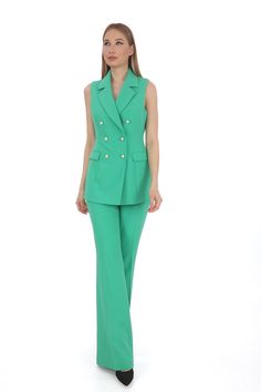 Elevate your formal attire with our Pearl Button Slim Fit Vest Pants Suit, designed to make a statement at any event. This elegant ensemble features a slim fit vest adorned with pearl buttons, complemented by tailored pants for a polished look. Perfect for business meetings, weddings, or special occasions, it combines sophistication with comfort. Crafted from high-quality materials, our suit set ensures a sleek silhouette and durability. The pearl buttons add a touch of luxury, enhancing its app Elegant Workwear Pants With Double Button Closure, Elegant Pants For Workwear With Double Button Closure, Sleeveless Suits With Buttons For Work, Elegant Double Button Pants For Work, Elegant Workwear Sets With Double Button Closure, Elegant Spring Sets With Buttons, Elegant Formal Pants With Double Button Closure, Elegant Tailored Dress Pants For Party, Elegant Formal Bottoms With Double Button Closure