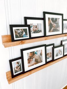 several frames are hanging on the wall with family photos attached to each one piece of wood