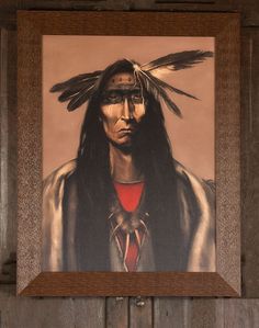 a painting of a native american man with long hair and feathers on it's head