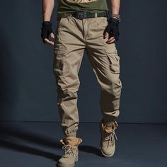 Hop on the utility fashion trend with our tactical cargo joggers for men. Perfect for both casual and sportswear, this attractive pair of men’s cargo pants is bound to add style to your whole look. Work out at the gym or go for a jog with maximum comfort. Try a pair now! ✅ Incorporating an exquisite cotton make, these tactical joggers for men are the epitome of utilitarian-inspired clothing. . ✅ Owing to their superior moisture-wicking properties, these pants will keep you dry and fresh all day Army Trousers, Casual Khaki Pants, Casual Pants Men, Cargo Pants Style, Tactical Cargo Pants, Camouflage Cargo Pants, Casual Pants Style, Military Pants, Camouflage Pants