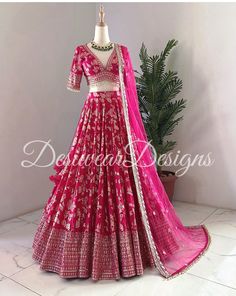 Made to Order/Measurement/Custom Order Lehenga - Color : rani pink - Fabric : embroidered silk - Fully flared paneled lehenga - Drawstring closure with Tassels - - It can be customize in any design or size  PLEASE NOTE: BUYERS ARE RESPONSIBLE FOR ANY CUSTOMS AND IMPORT TAXES THAT MAY APPLY. This is a made to order product. If you opt for 'Made To Measurement Option', we will provide a measurement template and you can share the measurements likewise. If you want to opt for 'Standard Size', Please Embroidered Fabric With Gota Work In Traditional Drape, Fitted Embroidered Fabric With Gota Work For Festivals, Dola Silk Embroidered Fabric With Gota Work, Fitted Anarkali Embroidered Fabric With Gota Work, Fitted Bollywood Embroidered Fabric With Gota Work, Wedding Banarasi Silk Choli With Gota Work, Fitted Embroidered Fabric With Gota Work For Designer Wear, Fitted Embroidered Saree Fabric With Gota Work, Banarasi Silk Sets With Gota Work For Reception