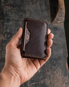 ◉ The wallet is made of 100% Full Grain, Vegetable Tanned Leather. ◉ When closed, the dimensions of the wallet are 3.5″ x 2.5″. (inches) ◉ The wallet is hand-stitched with waxed Japanese thread. ◉ The edges of the wallet are hand-finished/burnished with tokonole and beeswax for both aesthetic appeal and longevity. ◉ The wallet has one card slot that holds 9-11 cards and multiple folded bills. ◉ The wallet is built to last. --- SHIPPING AND DELIVERY --- ⚠️ Same Day Shipping- Fast (Express) Shipping- Free Shipping (India) ◉ Our products are prepared and shipped on the same day as your order. We have an express shipping system. The companies that we have express shipping agreements with are DHL and India Post. ◉ Our products are shipped with their special packaging. Our products are shipped w Brown Bifold Card Holder With Coin Pocket, Brown Trifold Card Holder With Smooth Grain, Brown Bifold Card Holder For Daily Use, Brown Trifold Card Holder For Daily Use, Brown Trifold Card Holder With Interior Slots, Brown Trifold Card Holder With Coin Pocket, Brown Card Holder With Card Slots For Everyday Carry, Rectangular Wallets With Card Slots For Everyday, Brown Bifold Card Holder With Card Slots