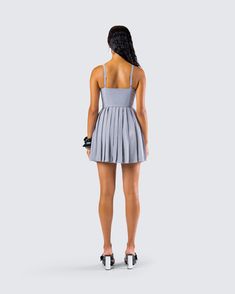 Command the attention of any room you walk into in this grey mini dress 🙌 Effortlessly chic and endlessly versatile, this piece is made from poly suiting fabric and complete with a fit & flare style and a pleated skirt 🖤 Grey Mini Dress, Suiting Fabric, Black Off Shoulder, Pleated Mini Dress, Graphic Top, White Jersey, Tennis Skirt, Pocket Pants, White Mini Dress