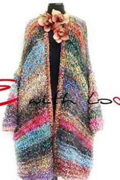 a woman's multicolored cardigan with flowers on it