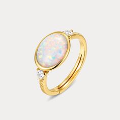 Feel timelessly elegant wearing this opal vintage ring. Handcrafted with an adjustable band for maximum comfort, its exquisite opal stone exudes sophistication and class. Make a subtle statement that speaks volumes with this timeless piece. DETAILS Plating: 18K Gold Materials: Silver,Opal Size: Adjustable Diameter: the main stone:0.39''*0.31''(10mm*8mm) Weight:  2g Adjustable Cabochon Opal Ring For Anniversary, Classic Round Opal Ring, Adjustable Oval Opal Ring For Wedding, Adjustable Opal Ring, Adjustable Oval Cabochon Opal Ring, Adjustable Oval Opal Ring For Anniversary, Adjustable Elegant Moonstone Ring Oval Cabochon, Adjustable Oval Opal Promise Ring, Adjustable Open Opal Ring For Anniversary