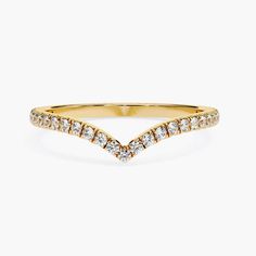 a gold ring with two rows of diamonds