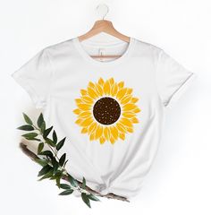 Sunflower Custom Shirt, Sunflower Shirt, Sunflower Tshirt, Floral Shirt, Floral Tee, Gift For Her Product Information Solid colors such as black, white and pink are 100% cotton. Heather colors are 52% cotton and 48% polyester. Washing Care Instructors Use cold water when washing, do not use bleach, do not dry clean, and do not use an iron directly on the design. Shipping Process * Your order will be ready to ship in 1 business day. * First Class Mail: 2-5 business days. * Priority Mail: 2-3 busi Sunflower Tshirt, Cloth Painting, Sunflower Birthday, Sunflower Shirt, Types Of T Shirts, Women Camping, Floral Tee, Top Crop, Flower Shirt