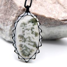 Beautiful handmade Macrame white & green Moss Agate pendant, with an adjustable black necklace cord. Moss Agate, is known as a prosperity and abundance crystal that attracts wealth and explanation in all fields of life. It helps in successful new beginnings and can bring new love into your life. This beautiful necklace can be the perfect meaningful gift for a loved one or yourself!  ►►This is a one-of-a-kind necklace, you will receive EXACTLY the one seen in the photos! *'¨) ¸.*'¸.**'¨) ¸. (¸.*' Nature-inspired White Necklace With Natural Stones, Adjustable White Nature-inspired Necklace, White Adjustable Nature-inspired Necklace, White Oval Adjustable Necklaces, Adjustable White Crystal Pendant Necklace, White Adjustable Crystal Pendant Necklace, White Adjustable Pendant Crystal Necklace, Adjustable Oval White Necklaces, White Adjustable Oval Necklaces