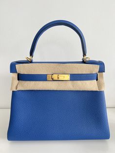 Hermès Kelly 28 Blue Royal Togo With Gold Hardware - AG Concierge Fzco Hermes Kelly 28, Kelly Bag, Hermes Bags, Gold Leather, Blue Bags, Full Set, Gold Hardware, Royal Blue, Blue Color