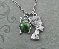 Nefertiti Necklace SMALL Nefertiti Jewelry Egyptian Necklace Egyptian Jewelry Scarab Necklace Silver Vintage Ankh Necklace In Metal, Green Metal Necklace With Charms, Vintage Ankh Metal Necklace, Green Metal Necklaces With Charms, Vintage Metal Ankh Necklace, Adjustable Green Metal Necklaces, Green Nickel-free Pendant Charm Necklace, Green Symbolic Nickel-free Jewelry, Green Metal Spiritual Necklace